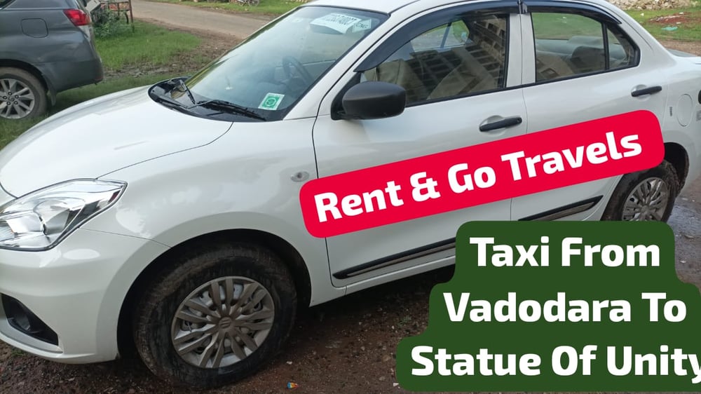 Dzire sedan wite with rent and go travels taxi from vadodara to statue of unity