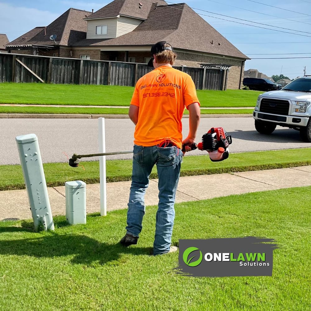 Lawn mowing, edging, blowing | Employee of OneLawn Solutions in Atoka TN, Munford TN, Brighton TN, Covington TN