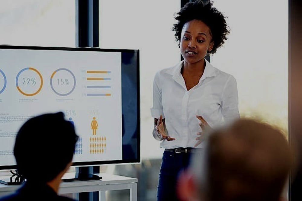 Woman leads presentation.