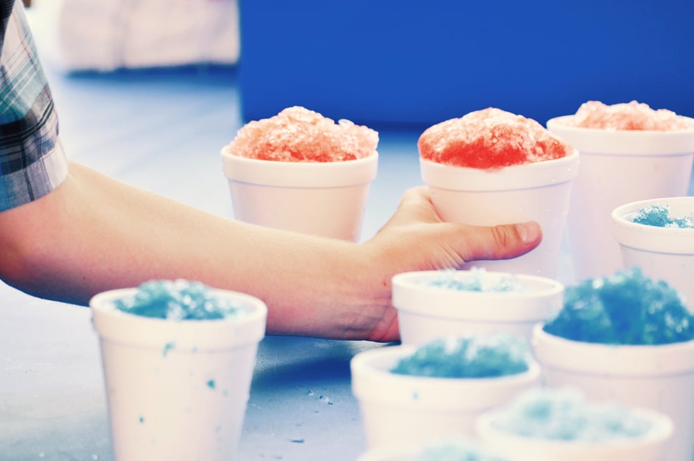 snow cones with a hand
