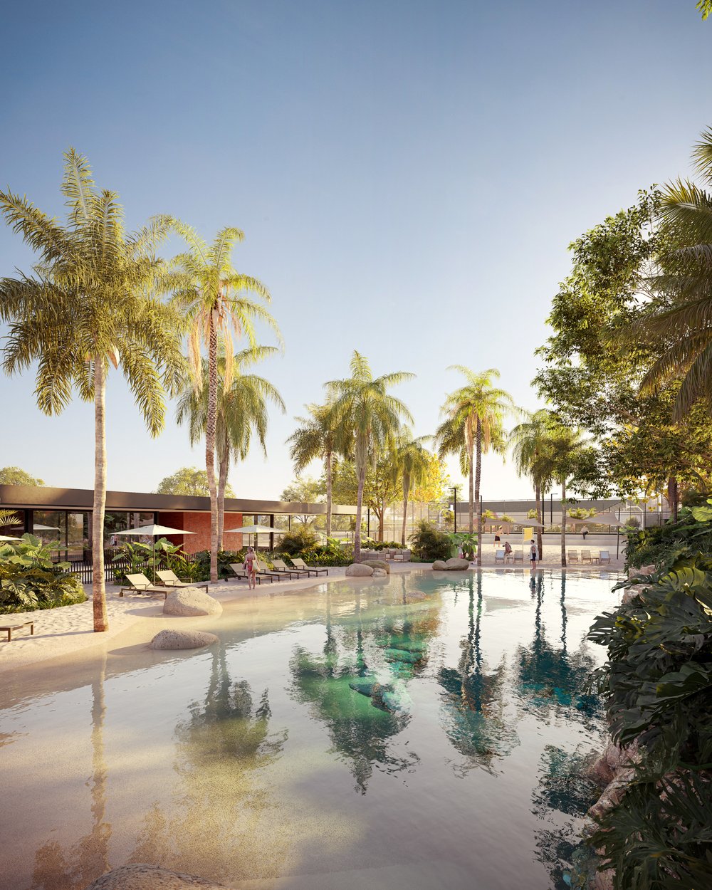 a pool with chairs and tables by it and buildings in the background