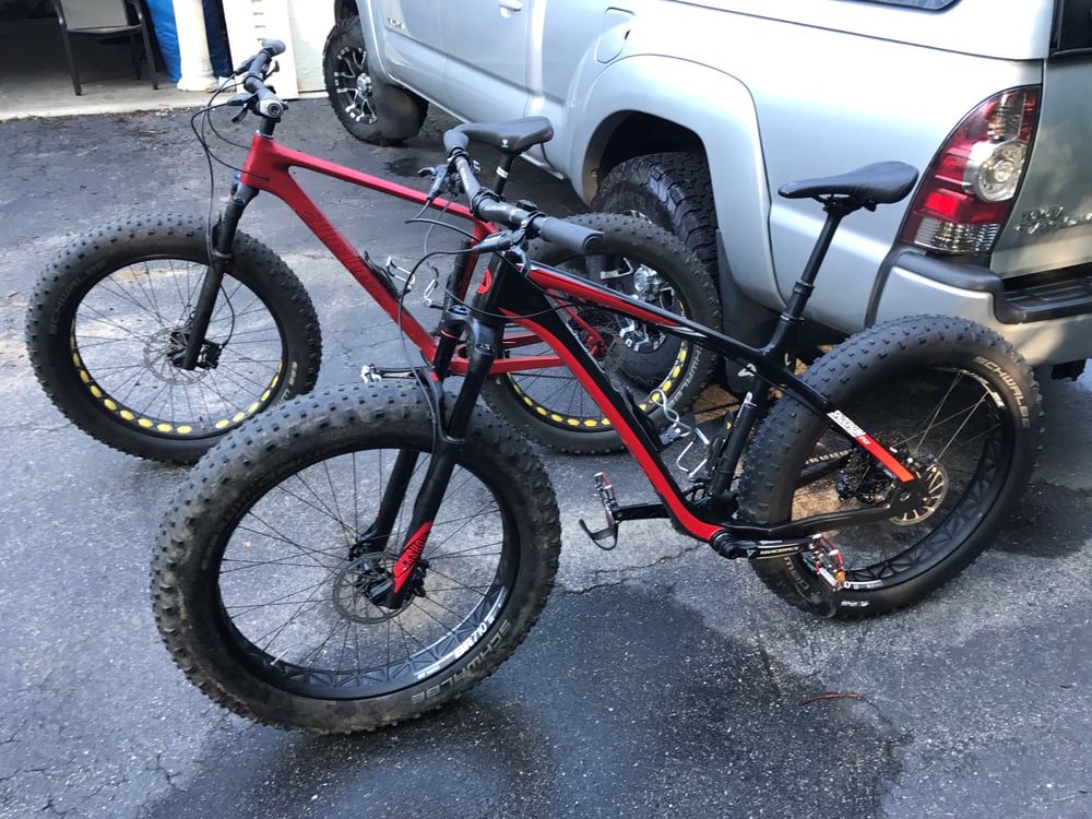 man riding motocross dirt motorcycle during daytime