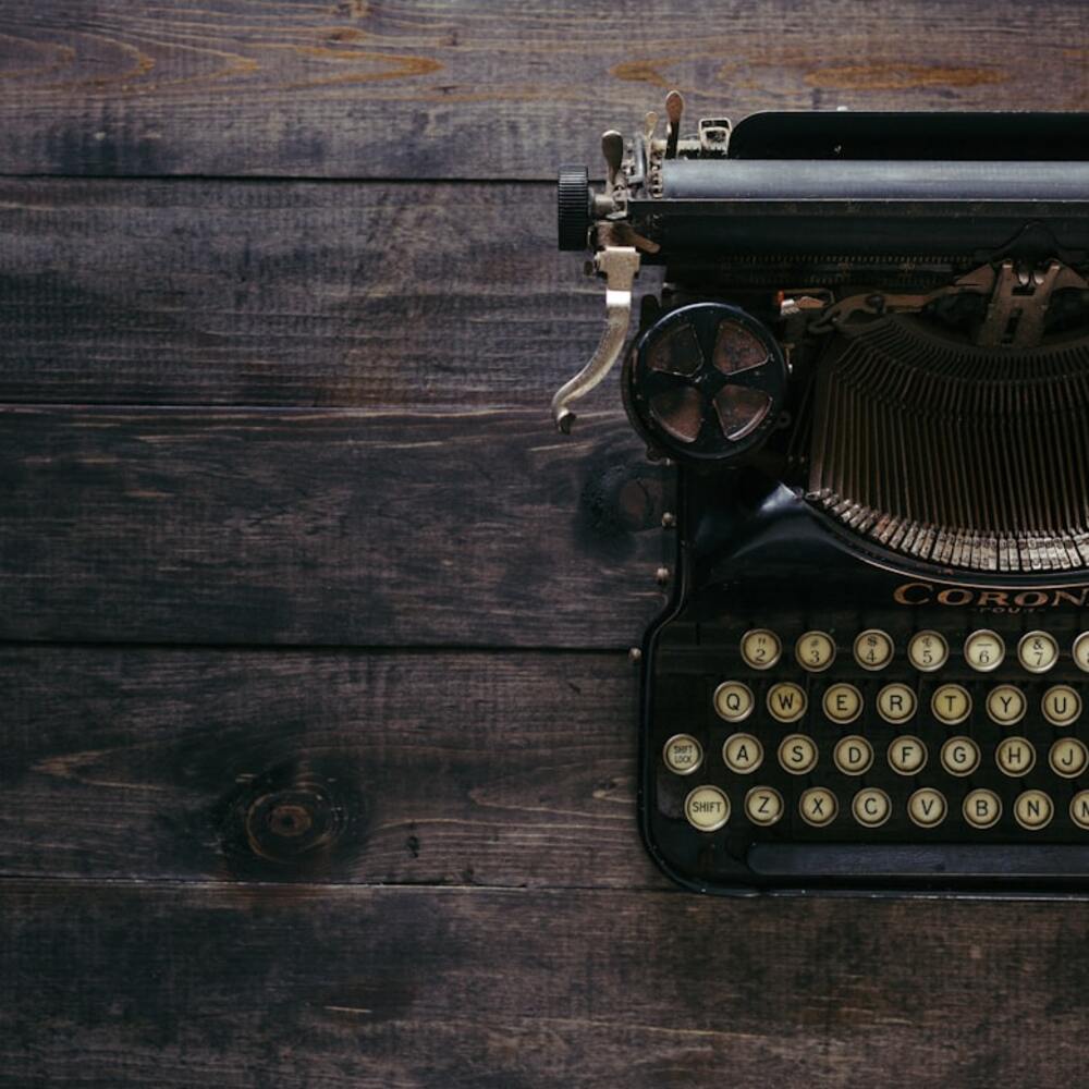 Antique Typewriter on Dark Wood