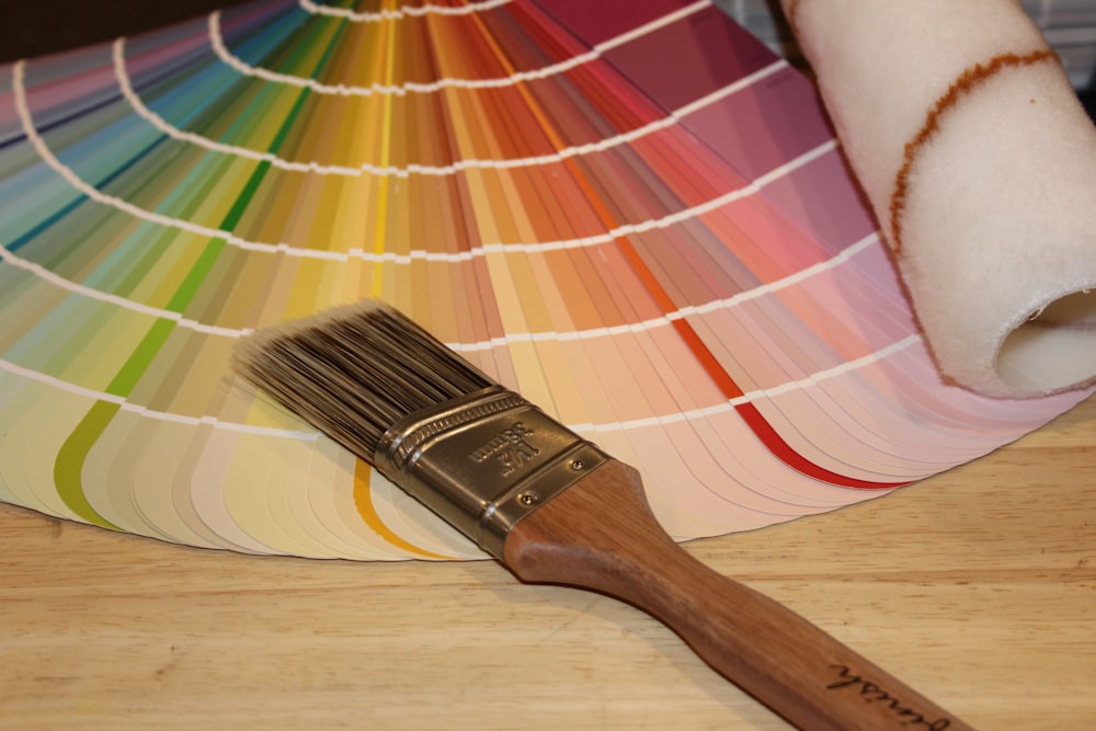 Paint fan and brush. Paint colors