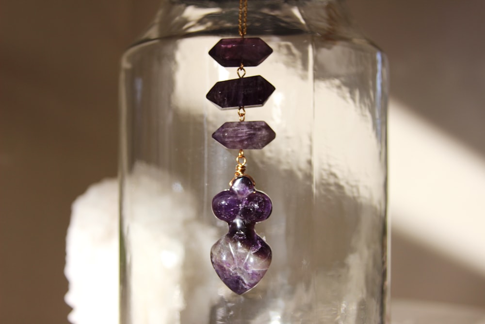 purple and white glass pendant lamp