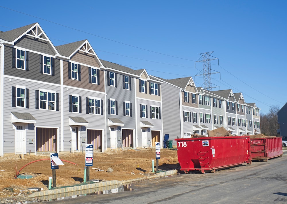 several cranes above the buildings