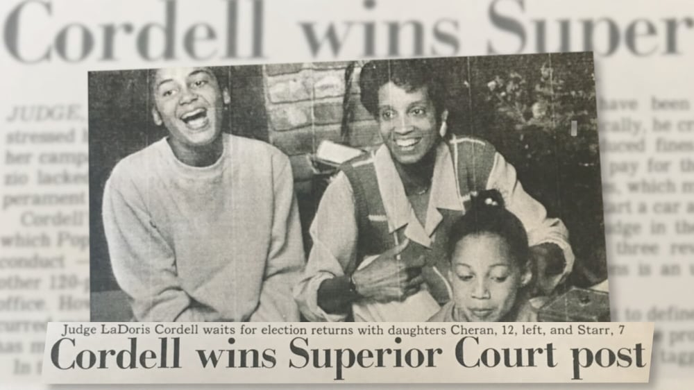 Old newspaper clipping featuring a photo of Judge Cordell and her two daughters titled “Cordell wins Superior Court post”